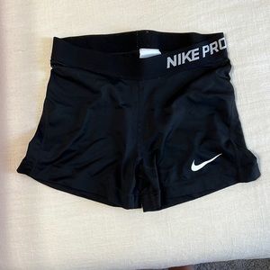 Nike woman’s compression shorts (spanks) in black, size medium